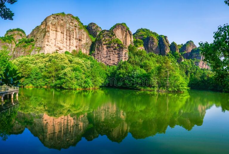 longhu-mountain-typical-danxia-landform-located-yingtan-city-jiangxi-province-also-famous-taoism-beautiful-reflection-149886909[1]