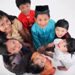 cute-children-wearing-traditional-clothing-huddling-against-white-background_1048944-9400591